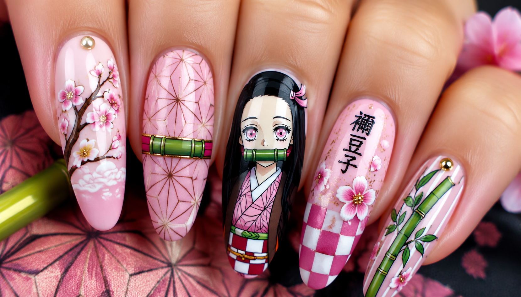 Detailed close-up of Demon Slayer Nezuko Kamado Pastel Pink Bamboo Nails custom handmade nail design