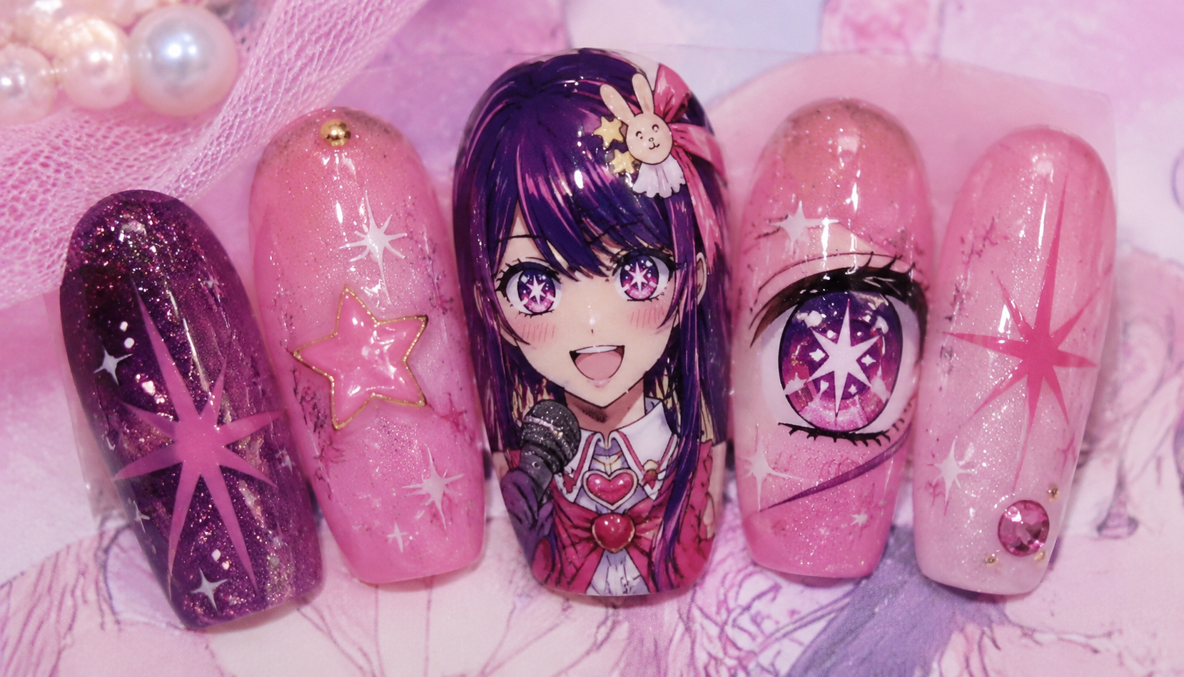 Detailed close-up of Oshi no Ko Ai Hoshino Idol Pink Star Eye Nails custom handmade nail design