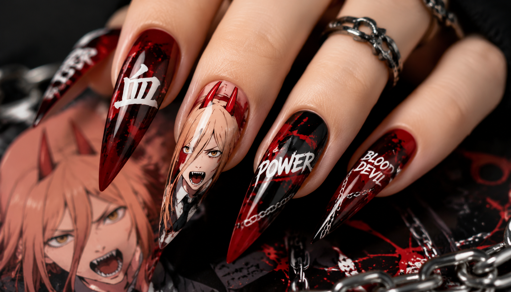 Detailed close-up showing the intricate hand-painted art of Power Blood Devil Crimson Horn Stiletto Nails